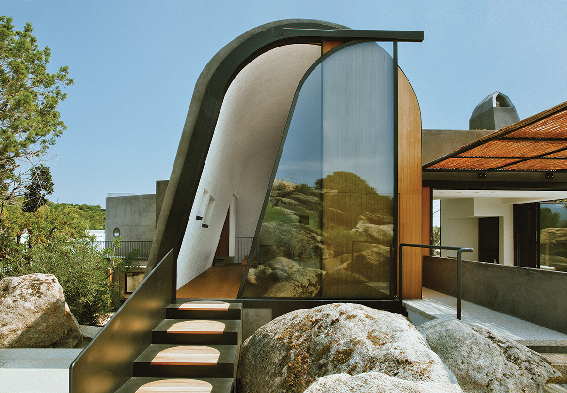 Stera Architecture's villa in Sardinia, Italy featuring a custom art deco inspired sliding door.